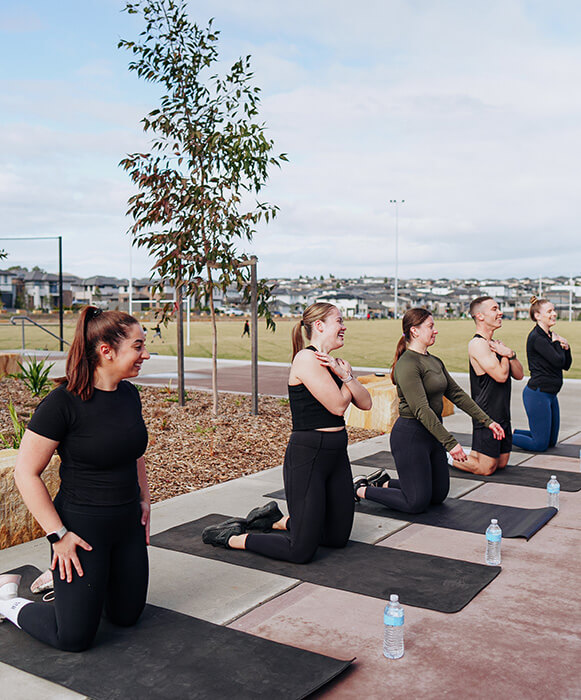 Group of people doing yoga