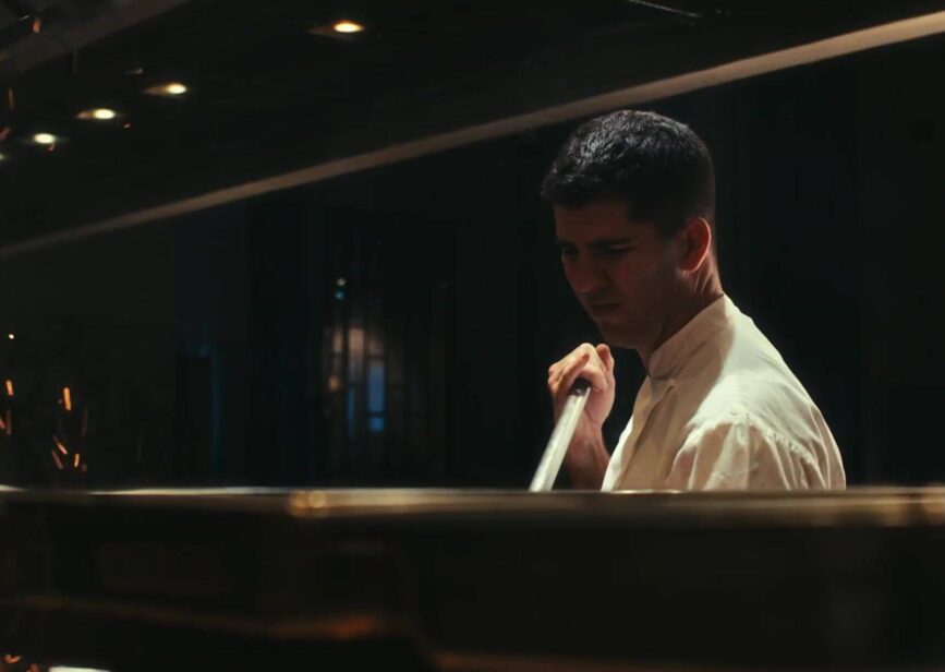 Man holding a mop handle