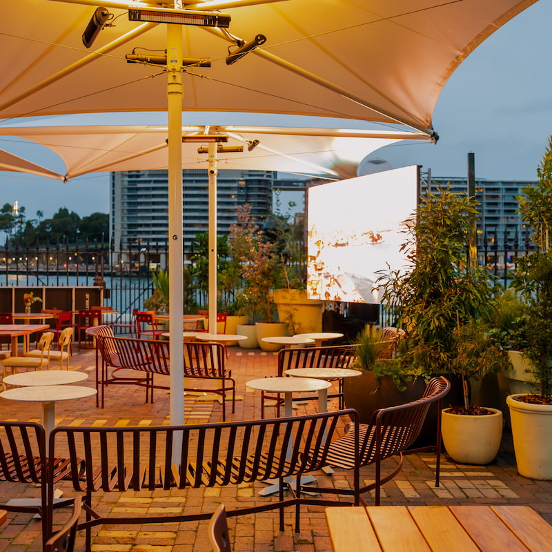 Rooftop Venue with Outdoor Seating & Umbrella | Visual Content and Marketing Solutions for Property Owners
